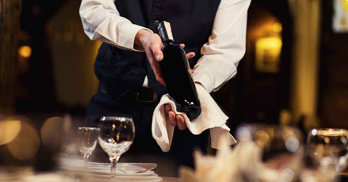 waitress serving wine